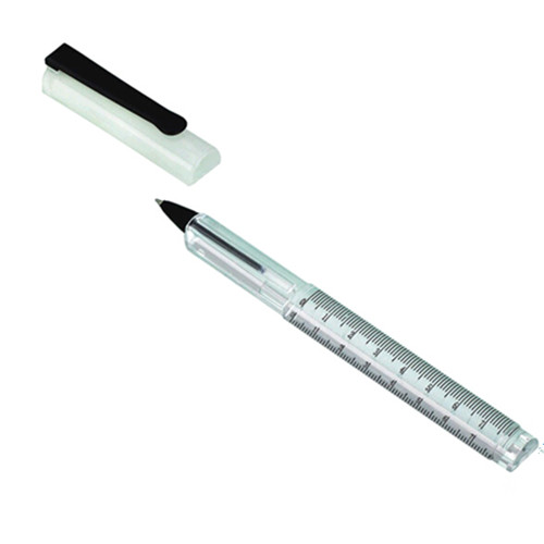 With ruler and magnifier and ballpoint pen magnifier