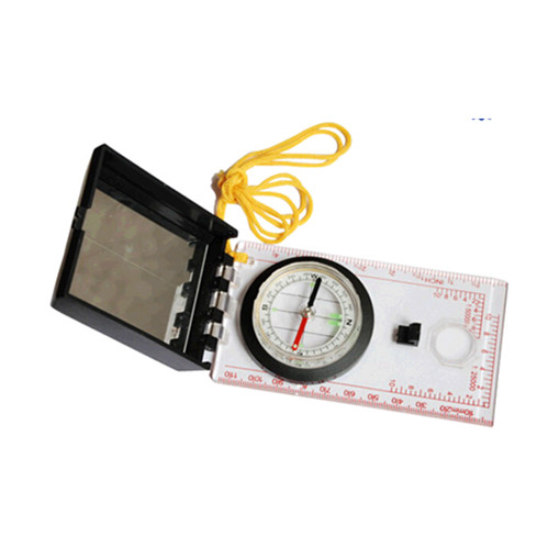 With measure ruler and mirror and map compass