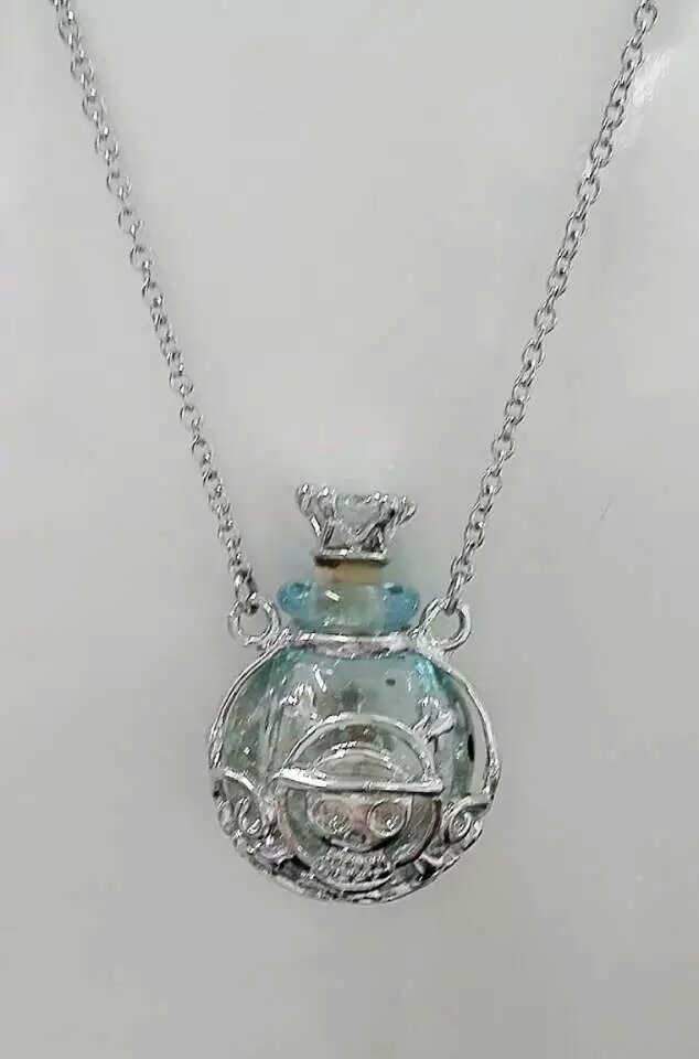 Wholesale human skeleton shape metal alloy box essencial oil green color bottle necklace with crown lid