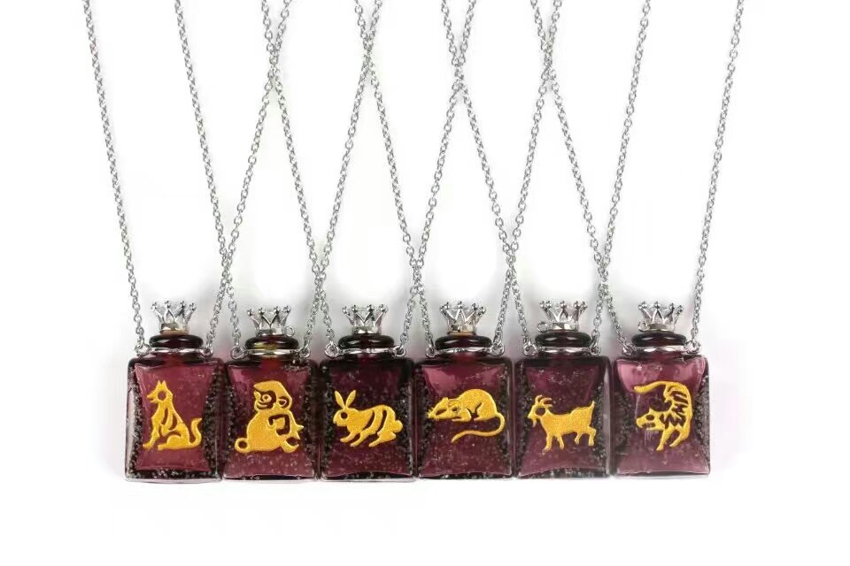 Wholesale brown color twelve animal bottle essencial oil necklace
