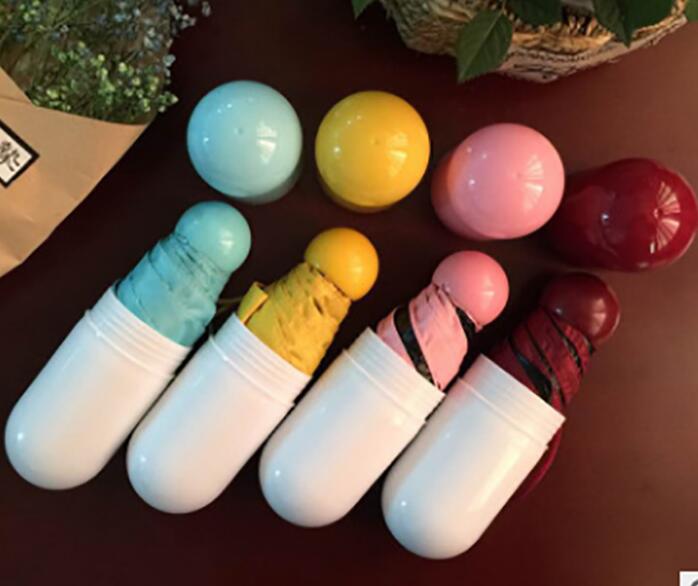 Wholesale oem logo pill shape 5 folding mini pocket uv umbrella